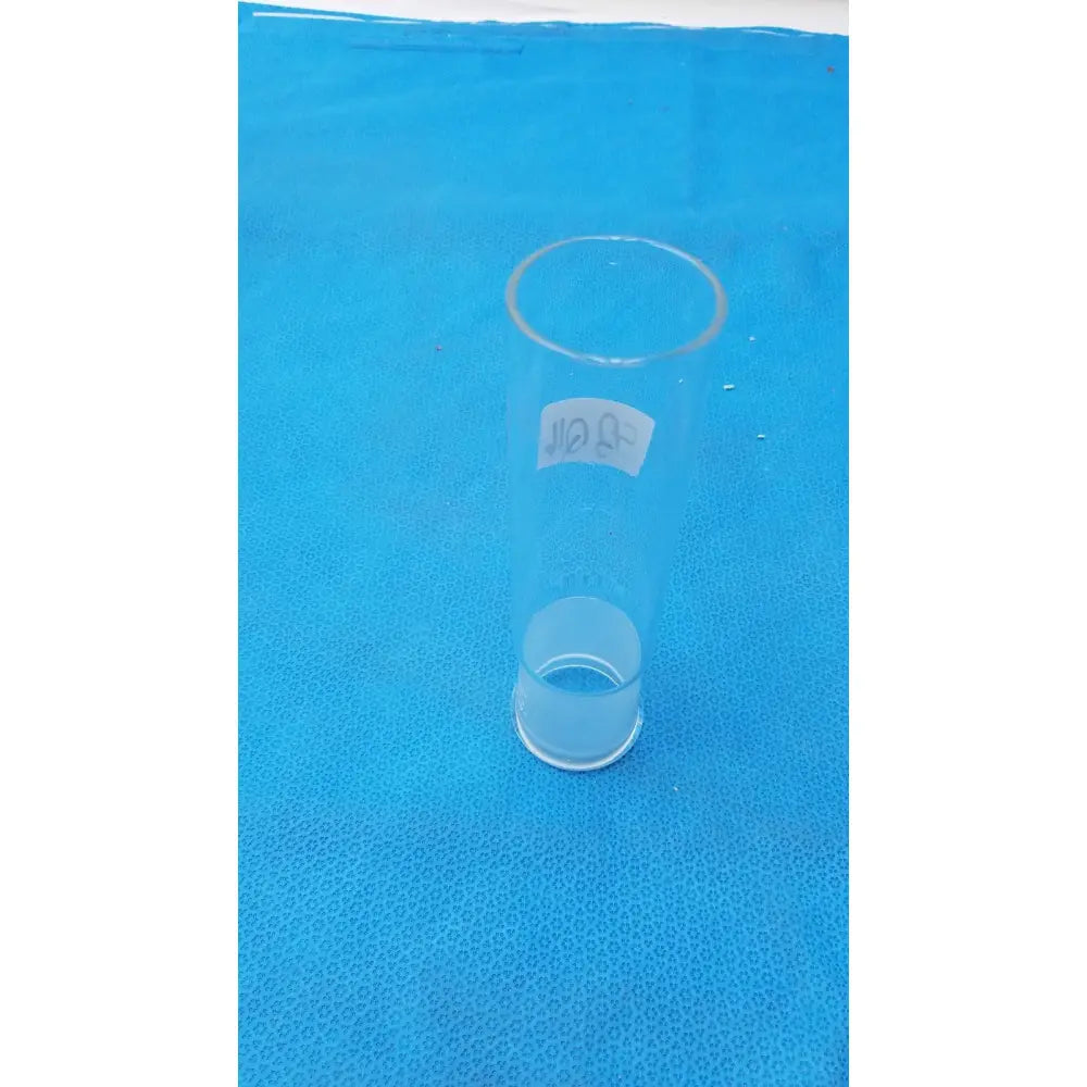 Clear glass pyrex ground glass graduated cylinder with white thai script label featuring ground glass joint 45/50 outer joint