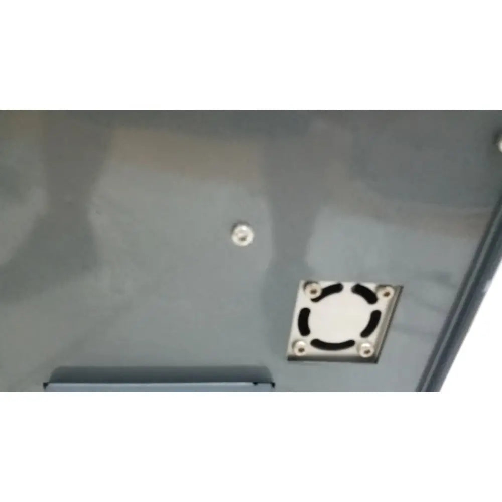 Silver circular vent cover with black curved slots and four screws on back of psq96 analysis pyrosequencer