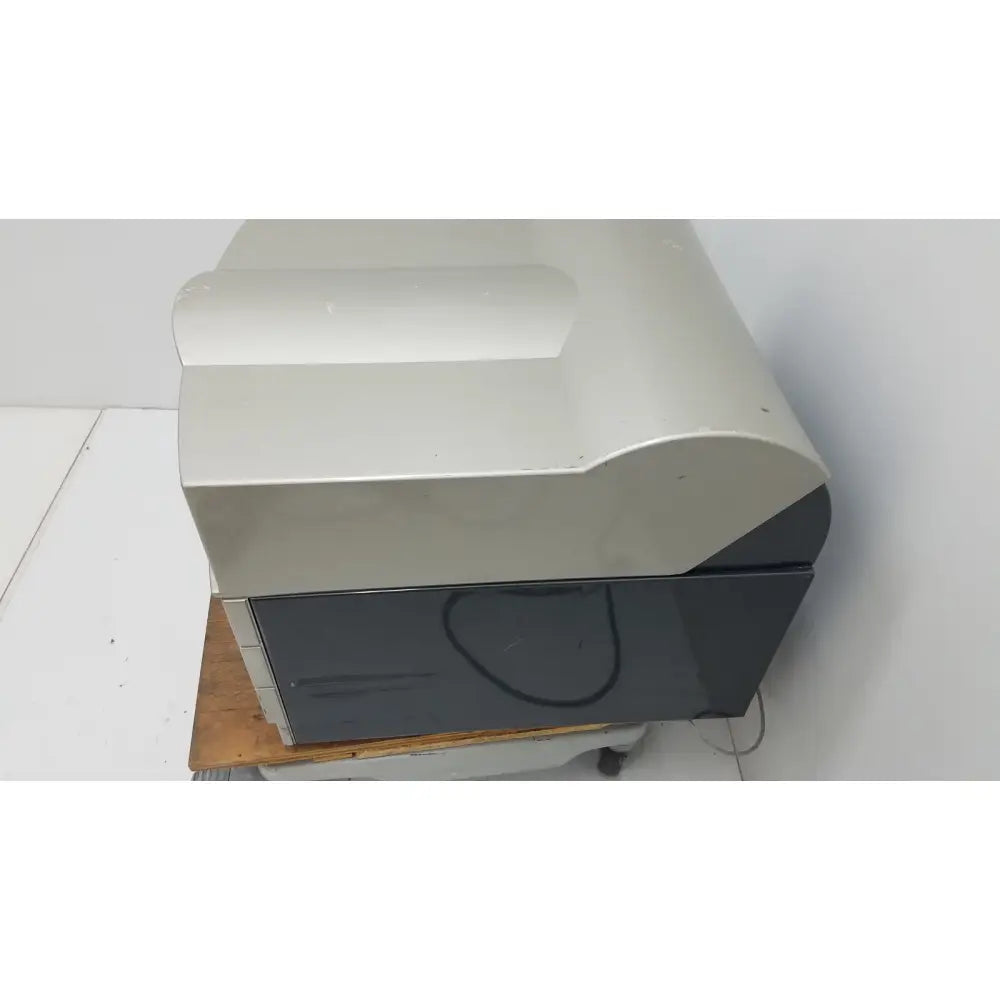 Gray and silver desktop printer with curved top lid for pyrosequencing psq96 analysis pyrosequencer use