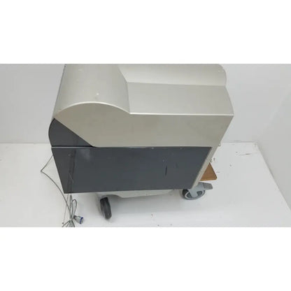 Silver and black industrial-grade pyrosequencing psq96 analysis pyrosequencer with curved top panel and caster wheels for mobility