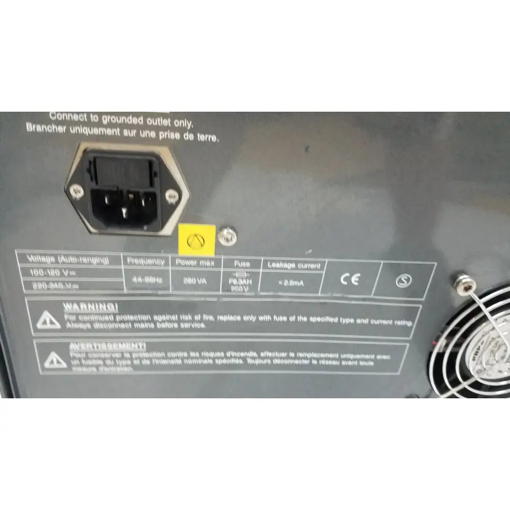 Black hexagonal power plug with grounding pin on gray metal panel at back of pyrosequencing psq96 analysis pyrosequencer