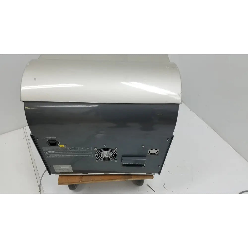 White and gray industrial-grade pyrosequencing psq96 analysis pyrosequencer showing black ventilation grille and control panel back