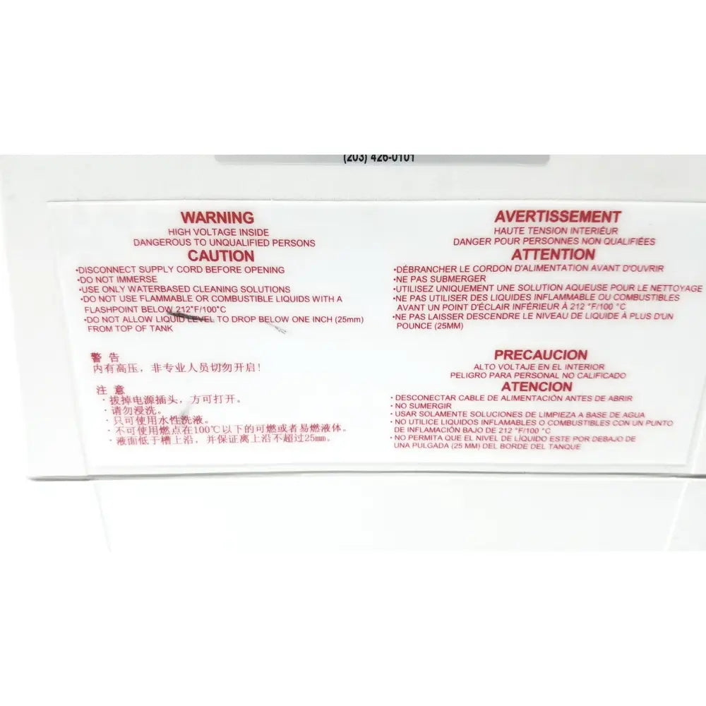 The back label on the white QSonica C75T ultrasonic cleaner displays safety warnings in English and Chinese