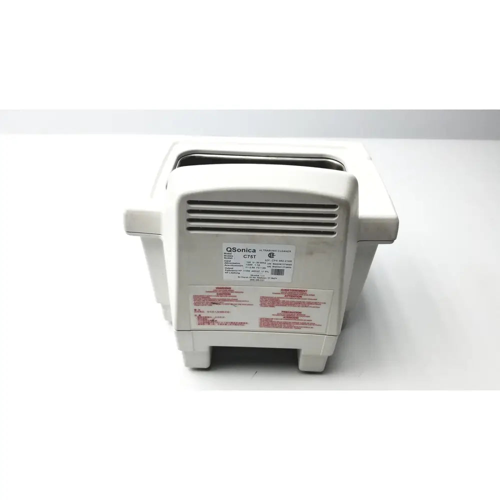 Off-white plastic qsonica c75t ultrasonic cleaner with rectangular slot and vented front panel for efficient cleaning