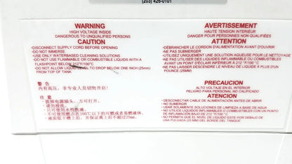 The back label on the white QSonica C75T ultrasonic cleaner displays safety warnings in English and Chinese