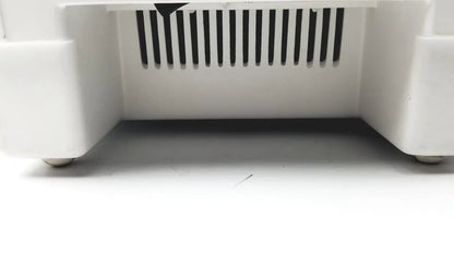 White plastic qsonica c75t ultrasonic cleaner with black vertical slats on front panel for precise cleaning