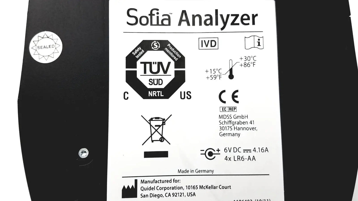 Black quidel sofia laboratory analyzer with white label showing certification marks and specifications on its back side