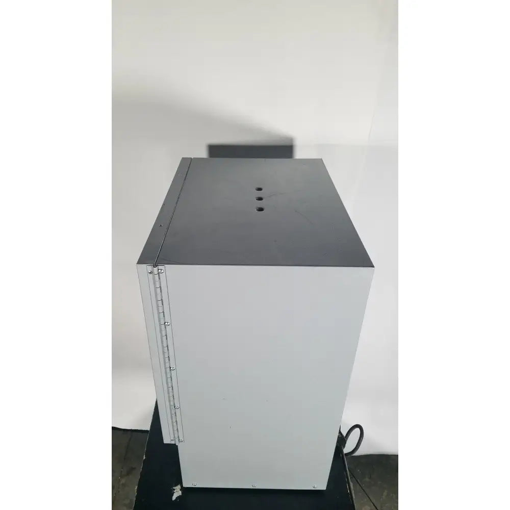 Gray metal industrial cabinet with flat top and screw-hole side panel for quincy lab 30gc gravity convection oven