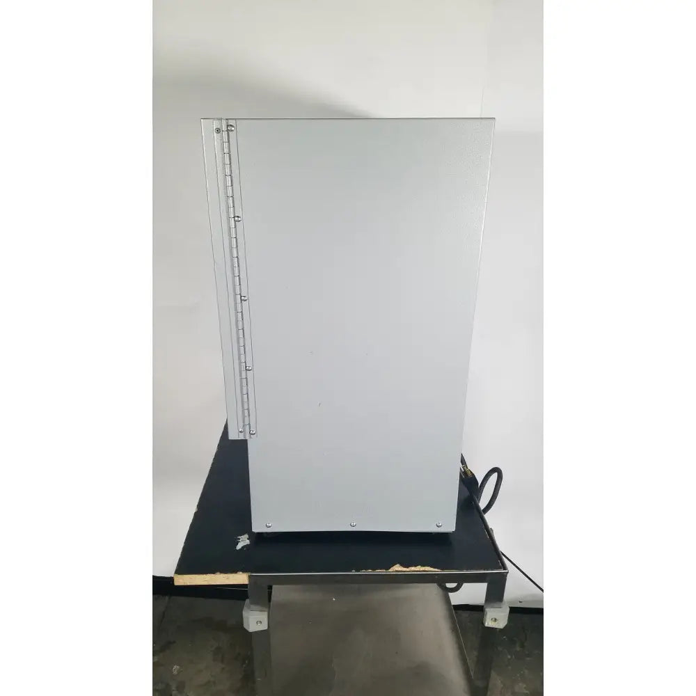 Silver metallic industrial cabinet with vertical left hinge for quincy lab 30gc gravity convection lab oven