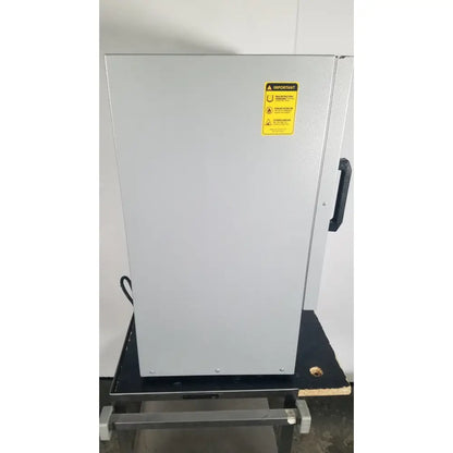 Silver industrial-grade quincy lab 30gc gravity convection lab oven with black handle and yellow warning label on the door