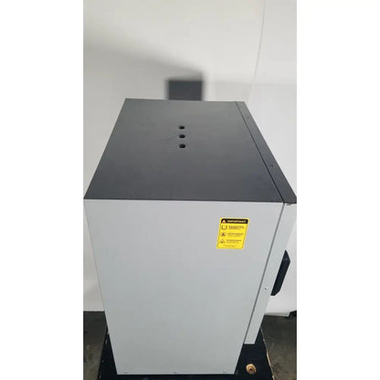 Gray industrial-grade quincy lab 30gc gravity convection lab oven with black top panel and yellow warning label