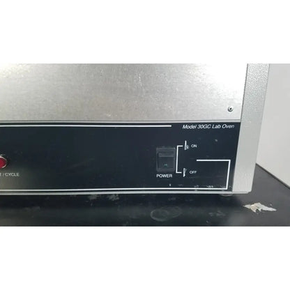 Silver metallic Quincy lab 30gc gravity convection lab oven with black control panel and red power button