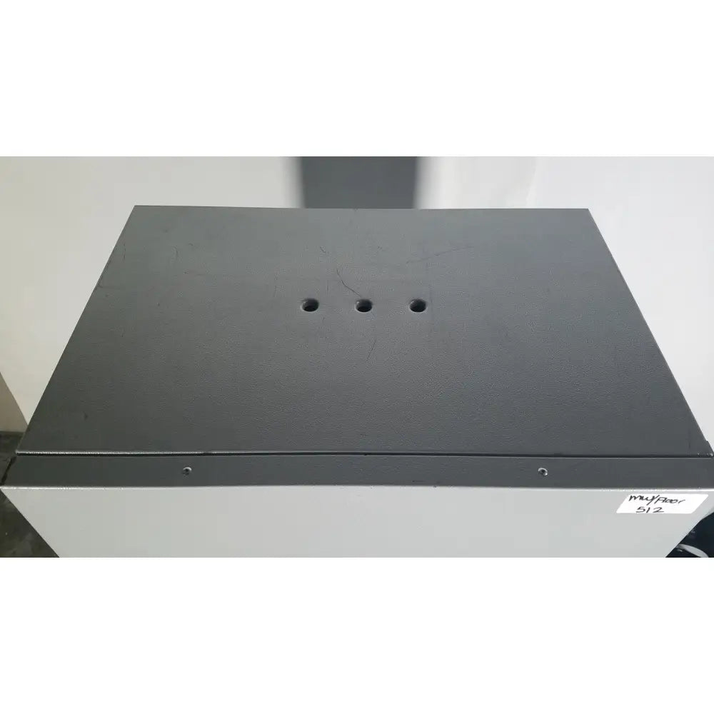 Black textured top panel with three circular holes on gray quincy lab 30gc gravity convection lab oven cabinet