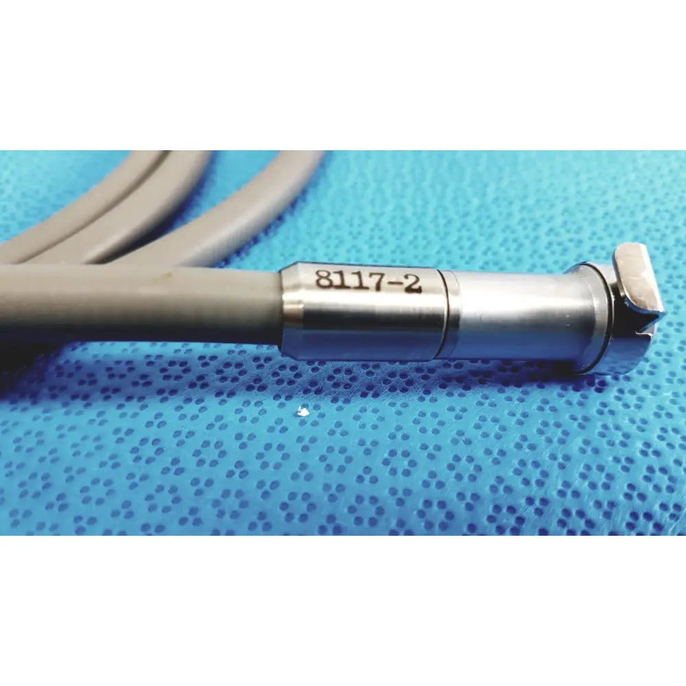 Gray and silver r wolf 8064.40 fiberoptic light cable with metallic tip and 8117-2 marking for surgical illumination