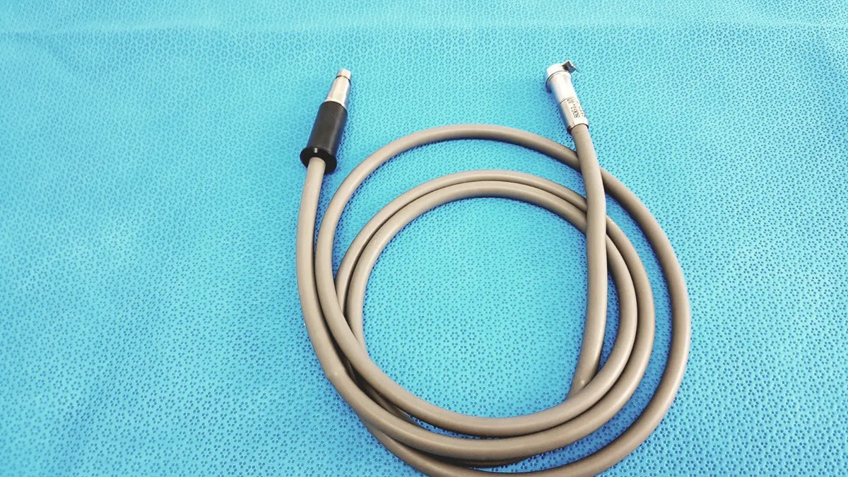 Gray flexible r wolf 8064.40 fiberoptic light cable with black and silver connectors for high-quality surgical illumination