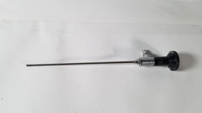 Black and silver rigid arthroscope with a 25 degree angle and a slender metallic shaft for precise surgical use by R Wolf