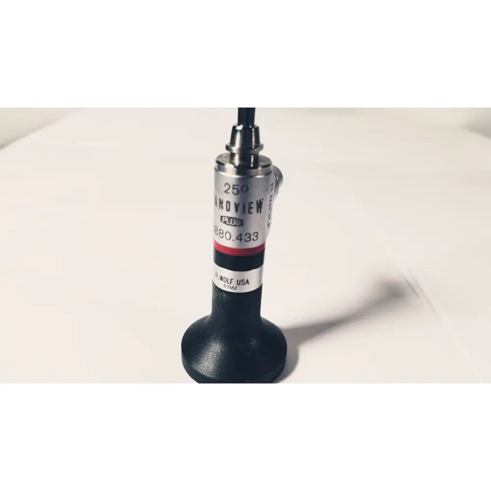 Black rubberized rigid arthroscope with silver metallic top and label reading 250 ankoview plus 880.433 p.wolf usa
