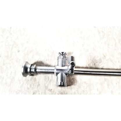 Silver metallic r wolf 8934.01 sheath with 8923.123 trocar 10mm featuring central cross junction and threaded ends for reuse medical laparoscopic instruments