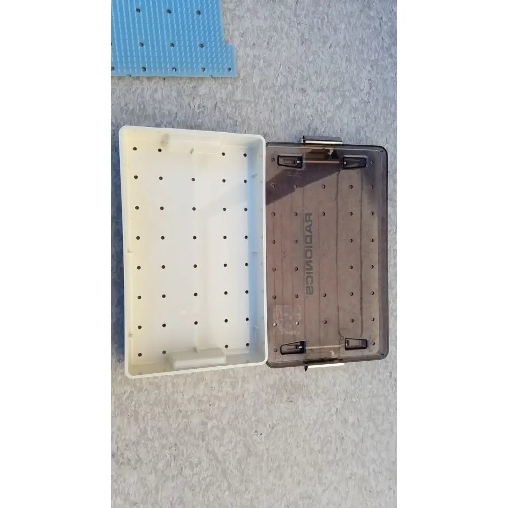 Transparent plastic radionics surgical sterlization case tray with beige interior and branded lid for surgical sterlization use