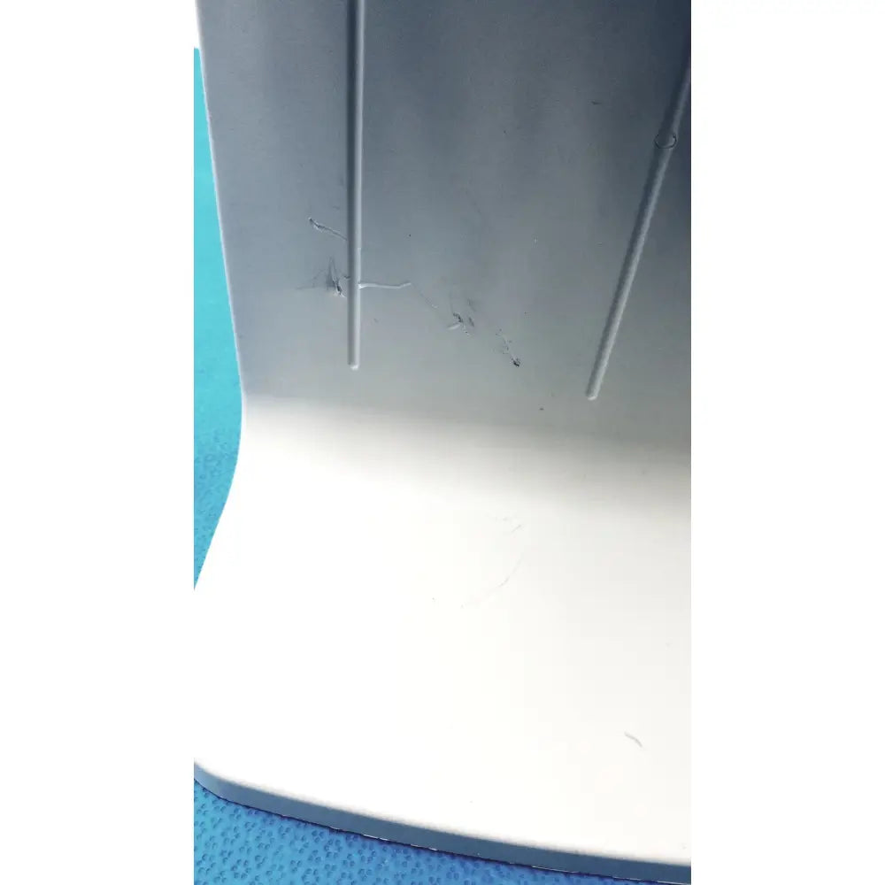 Gray plastic base with vertical ridges and minor scratches of rainin e3 rapid charge stand product back side