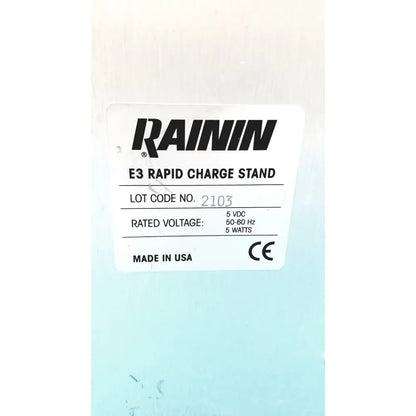 Back view of rainin e3 rapid charge stand with white label showing 5 vdc and 5 watts specifications