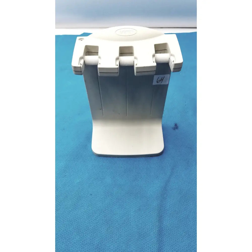 White plastic vax cash register drawer with three compartments and branded logo for rainin e3 rapid charge stand