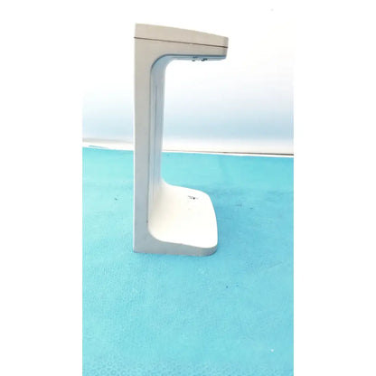 White plastic rainin e3 rapid rapid charger stand with sleek minimalist design and curved support arm