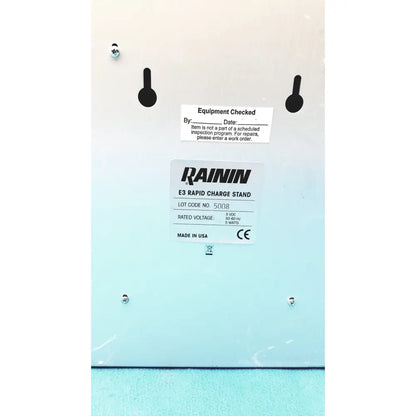 Light blue rainin e3 rapid charger stand with black mounting holes and white label showing technical specifications
