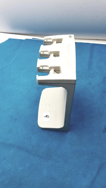 White plastic rainin e3 rapid charger stand with three slots and a small compartment for rapid charger organization
