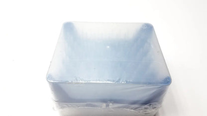 A translucent blue plastic container of rainin hr-1000 liftcover with 100 tips per rack wrapped in clear plastic film
