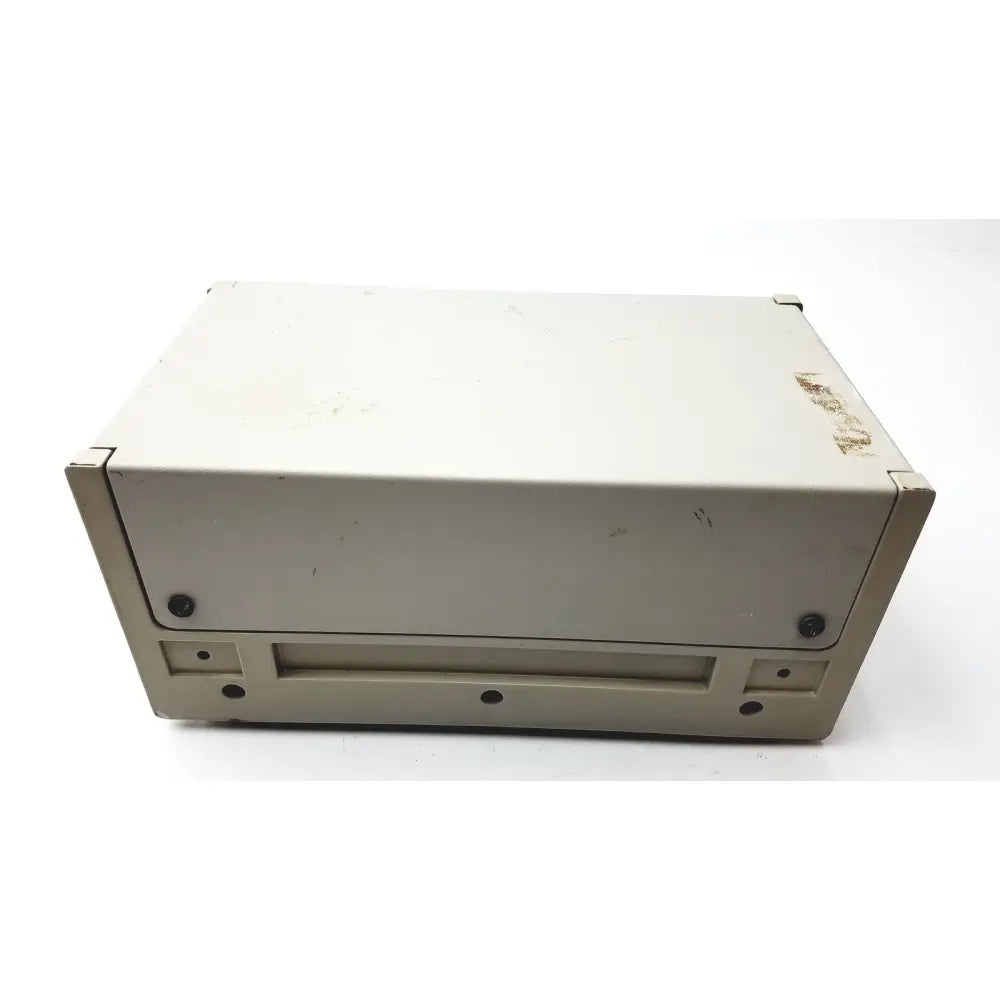 Beige metal rainin pressure module with rectangular slot and four black screws designed for reuse medical use
