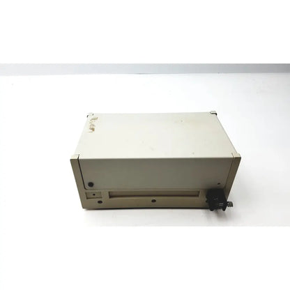 Beige rectangular rainin pressure module 8700 psi with front slot and black side components for precise pressure control