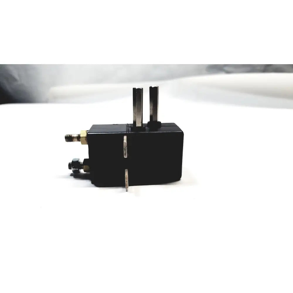 Black rectangular ravioli power contactor tl11p2-498 with metallic pins and brass threaded fittings for electrical use