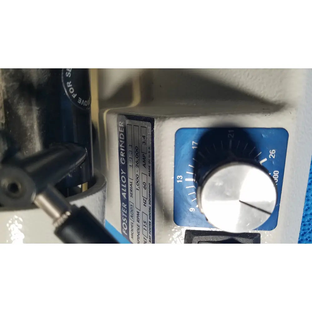 Blue and silver dial control panel on ray foster high speed dental alloy grinder ag05 for precise alloy grinding