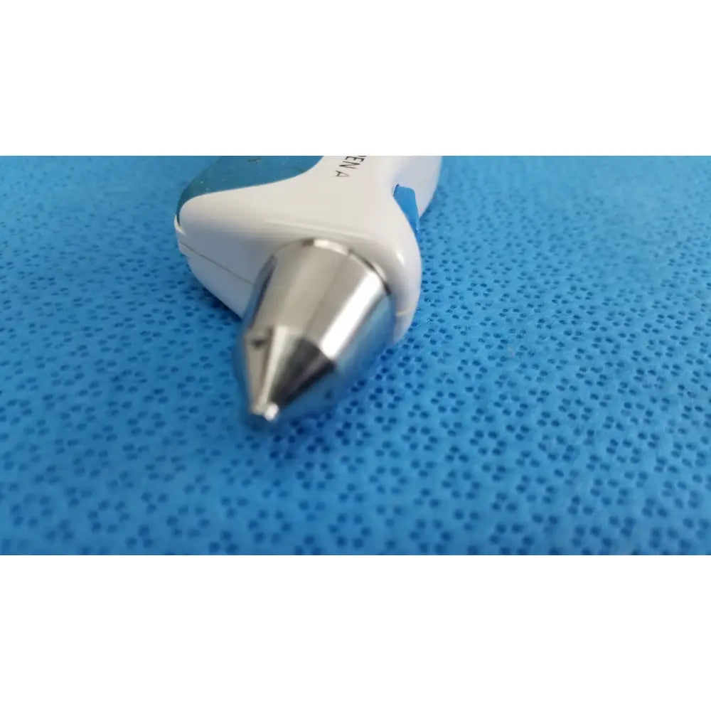 White and blue handheld tono pen avia tonometer with metallic silver tip and protective case for eye pressure measurement
