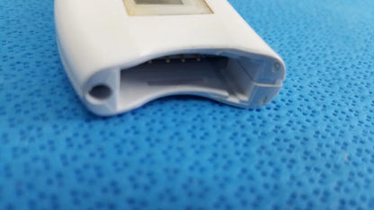 White plastic pulse oximeter with rectangular screen and sensor contacts for Reichert tono pen avia handheld tonometer case