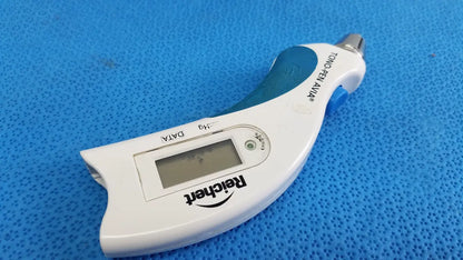 White and teal reichert tono pen avia handheld tonometer with metallic tip and small digital screen in a protective case