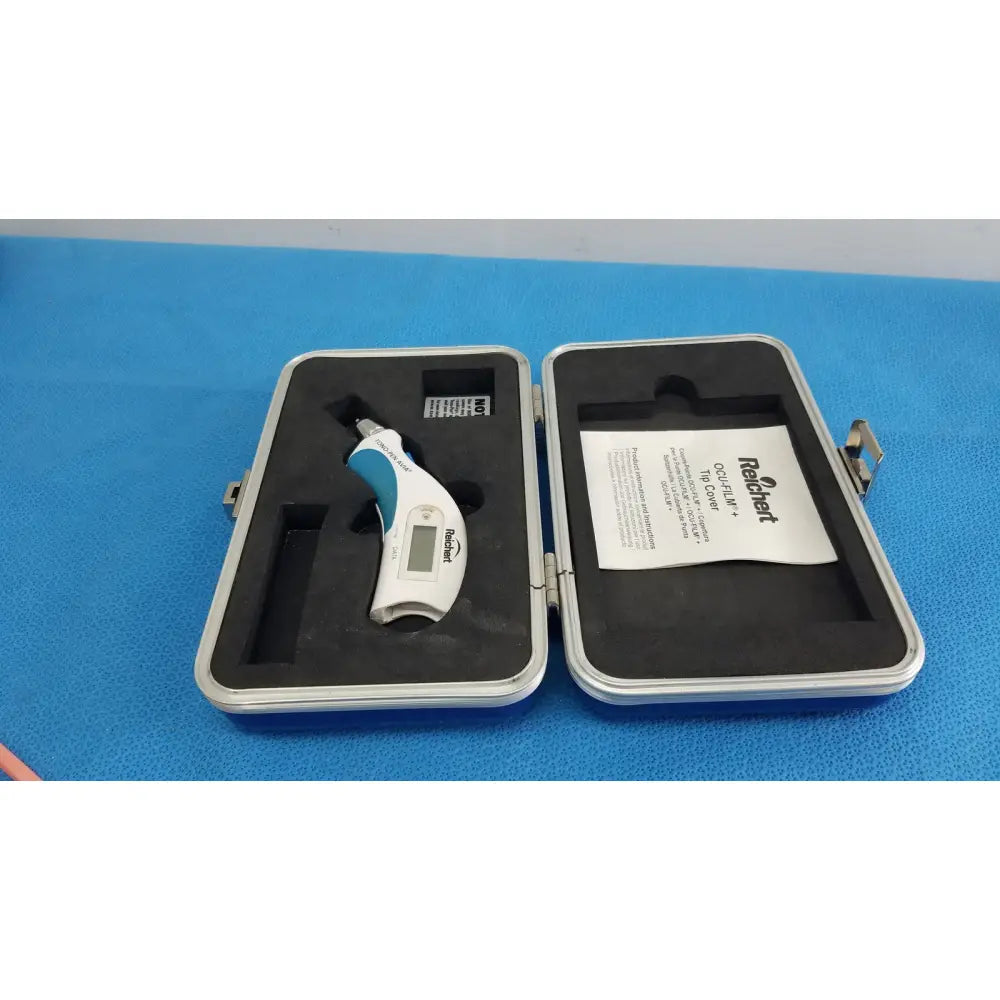 White and teal reichert tono pen avia handheld tonometer in a silver protective case for precise eye pressure measurement