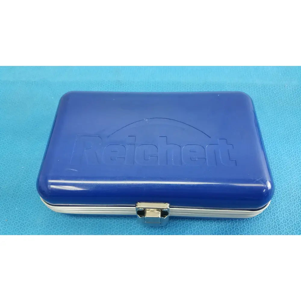 Blue Reichert tono pen avia handheld tonometer metal case with silver clasp for secure storage and transport