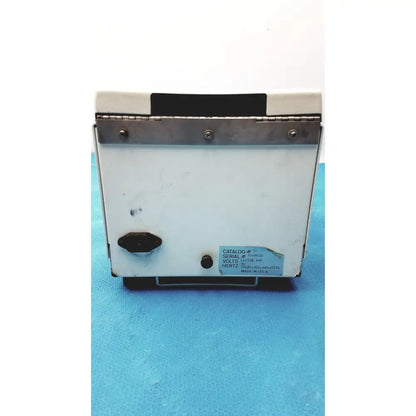 White rectangular reliable scientific quick spin 18 micro centrifuge 115v with black handle and usa label visible
