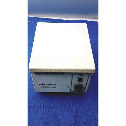 White plastic reliable scientific quick spin 18 micro centrifuge 115v with black knob and power switch