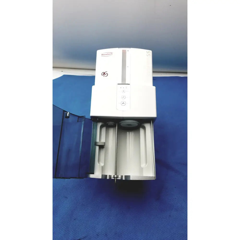 White bemfort wall-mounted air purifier with sleek silver accents designed as part of renfert sympress impression mixing machine