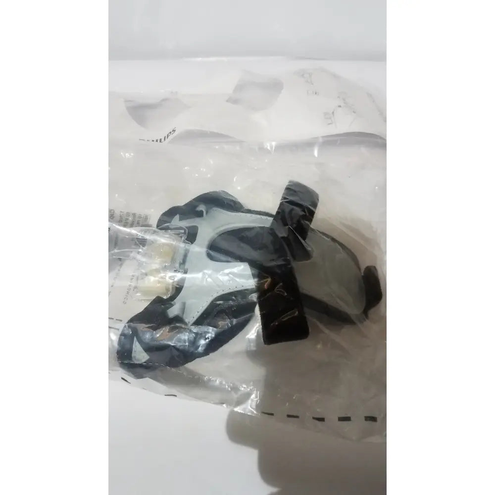 Black and gray philips af531 ee leak capstrap hearing aid device in clear plastic packaging genuine oem reuse medical product