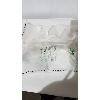 A white translucent plastic bag containing a genuine OEM respironics af531 ee leak capstrap single-use medical device