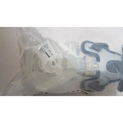 Clear plastic bag containing genuine oem respironics af531 ee leak medical-grade oxygen mask with capstrap single-use