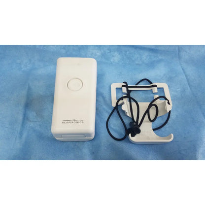White respironics alice pdx portable sleep diagnostic system with matching carrying mount and black adjustable strap