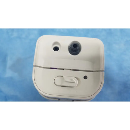 White plastic charging case for wireless earbuds with rounded design and slider switch for respironics alice pdx system