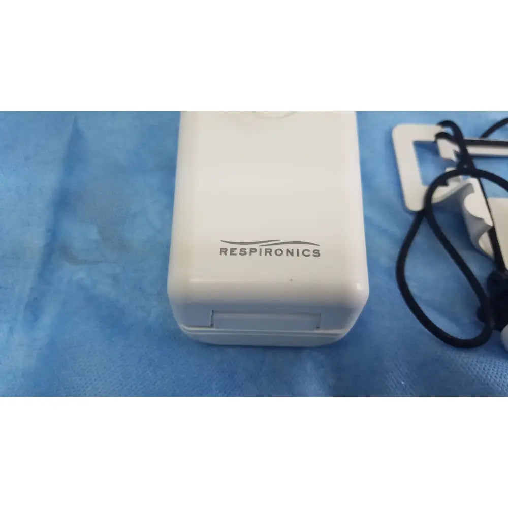 White respironics alice pdx portable sleep diagnostic system with sleek rectangular plastic casing and alice pdx ref 1043941