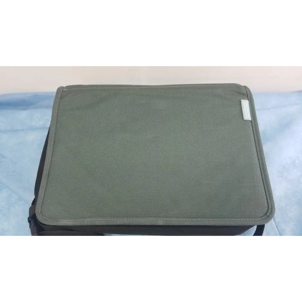 Olive green canvas laptop case with black trim and stitched edges for respironics alice pdx portable sleep diagnostic system