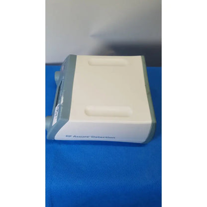 White and gray rf assure detection console model 200x with sleek rectangular design for reliable assure detection